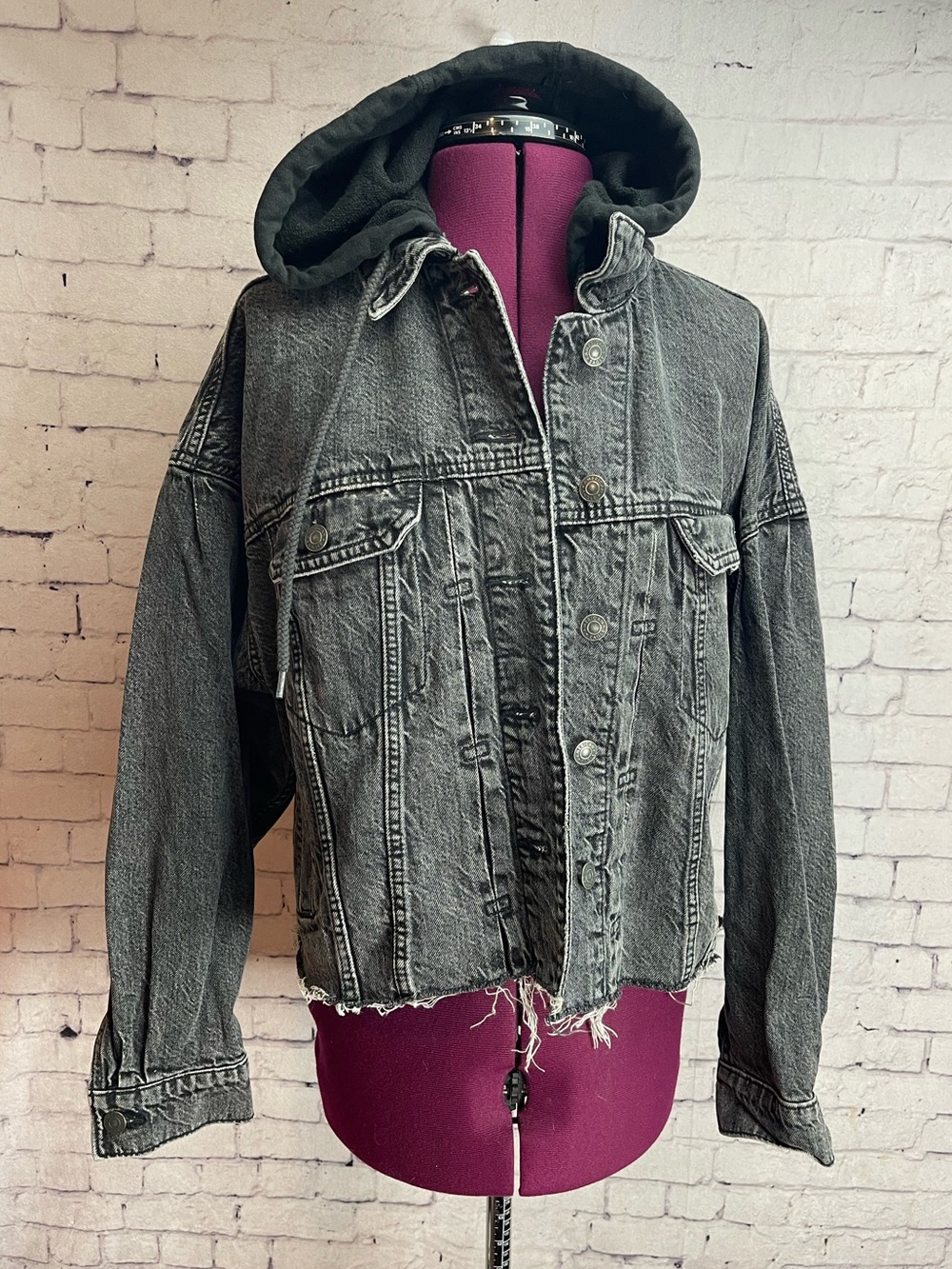 American Eagle Outfitters size medium distressed black jean jacket with hood